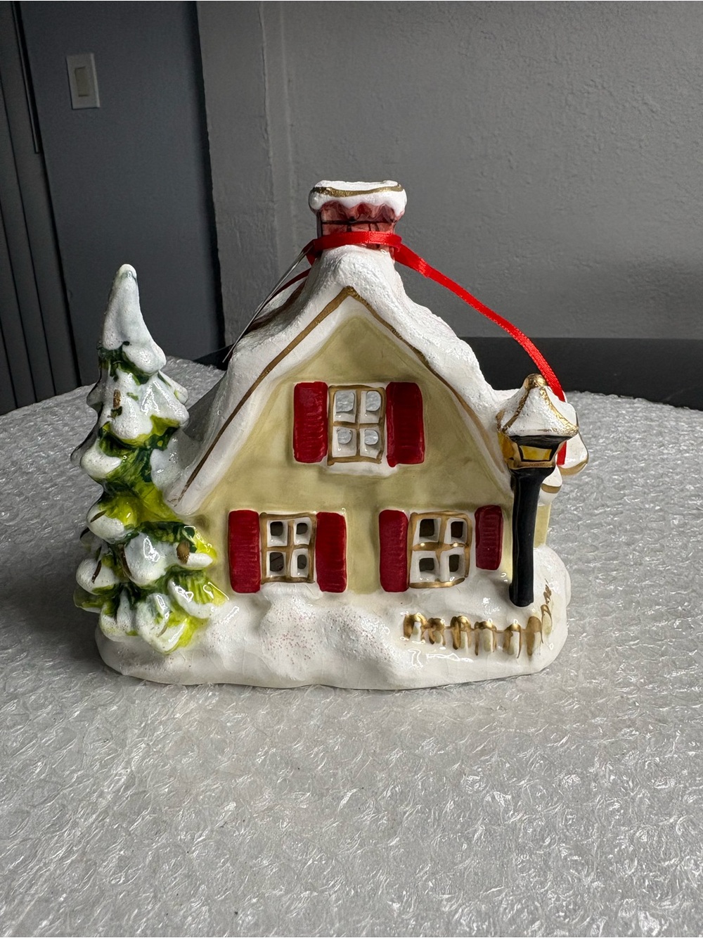 Blue Sky White Ceramic Cottage Ornament with Red Shutters